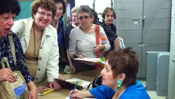 Signing copies of An American Bride in Kabul in central Queens