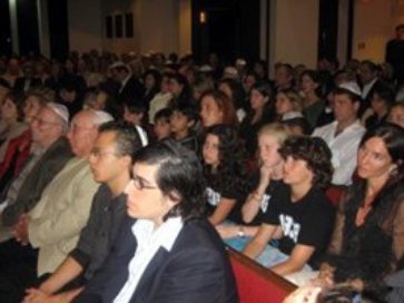 The 12 year old students pictured in the second row made a major presentation about the 1.5 million children who were murdered in the Holocaust. They have embarked upon a campaign to collect 1.5 million pennies -- one for each child. They are shown here together with their Hebrew school teacher, Lorraine Shaked.