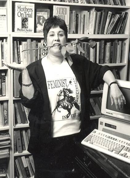 1990 - 1991. Here I am wearing my “Feminist Government in Exile” tee-shirt, a gift from Merle Hoffman, with the proverbial rose in my teeth.