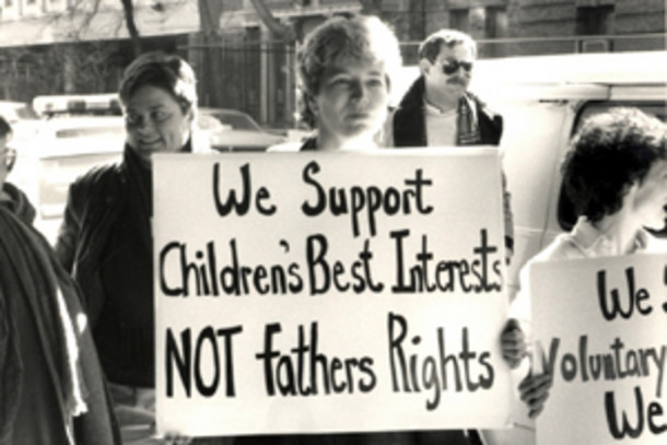 1986. While Dr. Chesler and other feminists spoke out indoors about custody, a group of demonstrators formed outside the building. Unwilling to be out-voiced, a group of women from the Custody Speak Out quickly drew up placards and went outside as a counter demonstration, pictured here.