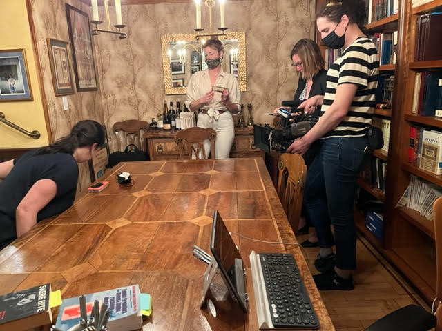Here are four members of an eight-woman/man crew in my home who came to interview me at great length for a TV documentary. Can’t say anymore yet. They worked quietly, professionally, as if they were a theater ensemble and it took them at least an hour to set up all the equipment and another hour to disassemble it.